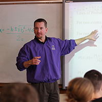 Brent Larson teaches math in his classroom at Omaha Central High