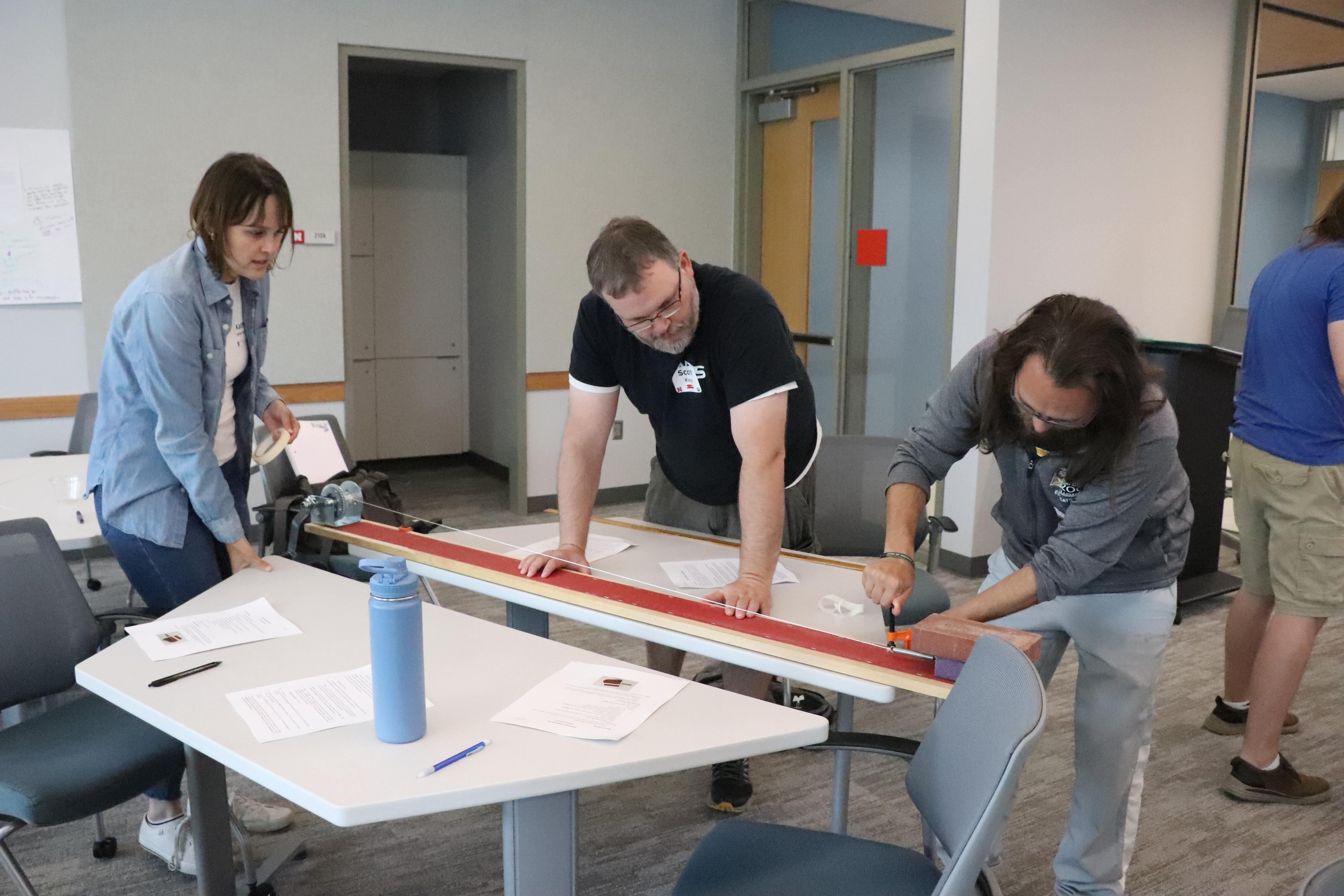 teachers conducting science experiment