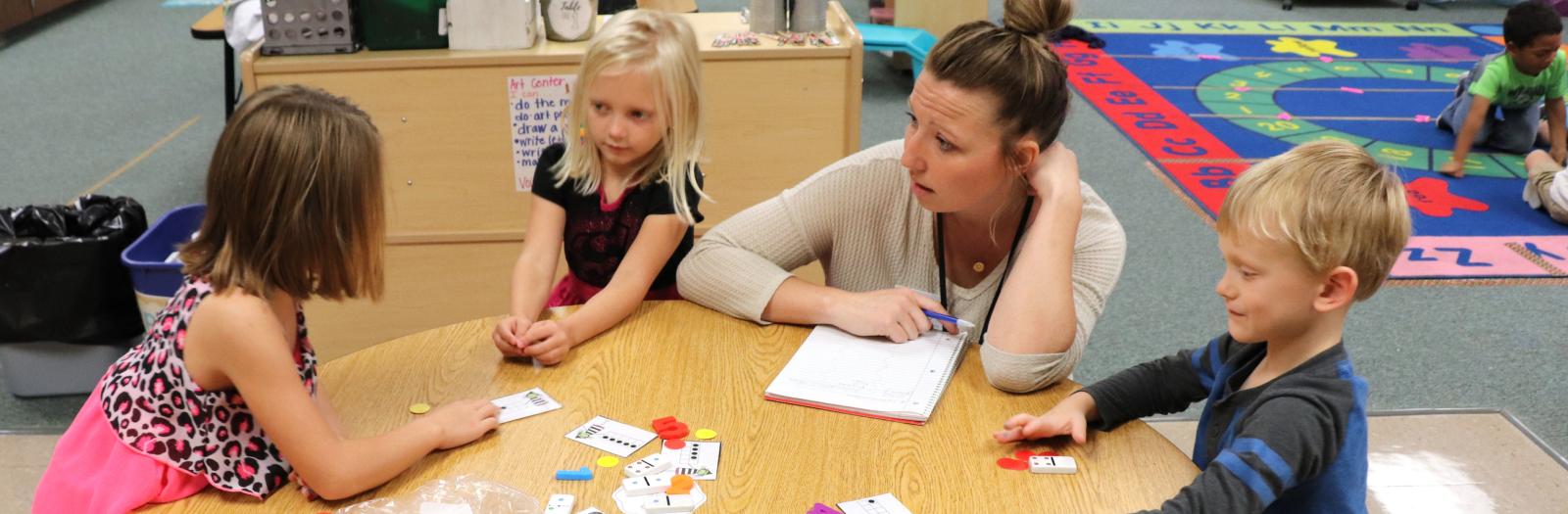 Teacher working with kids