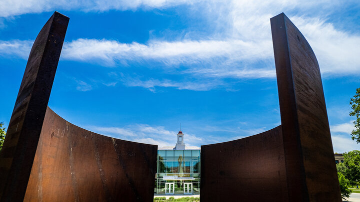 The Greenpoint sculpture frames the north entrance of the Adele Hall Learning Commons on the University of Nebraska-Lincoln campus.