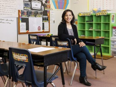 menon sitting in classroom 