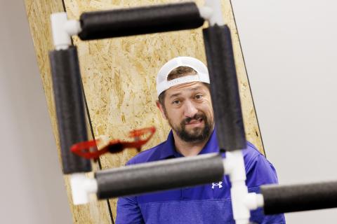 Concentration shows on Nick Restau’s face as he tries to pilot a small UAV through an obstacle course at Nebraska Innovation Studio. Restau, from Milford Public Schools, is one of several teachers training to get their drone license in a class taught by Travis Ray from NIS.