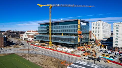 Kiewit Hall construction remains on pace for a spring 2024 opening. Removal of the crane used for exterior construction will cause a March 14 shutdown of pedestrian and vehicle traffic along Vine Street.